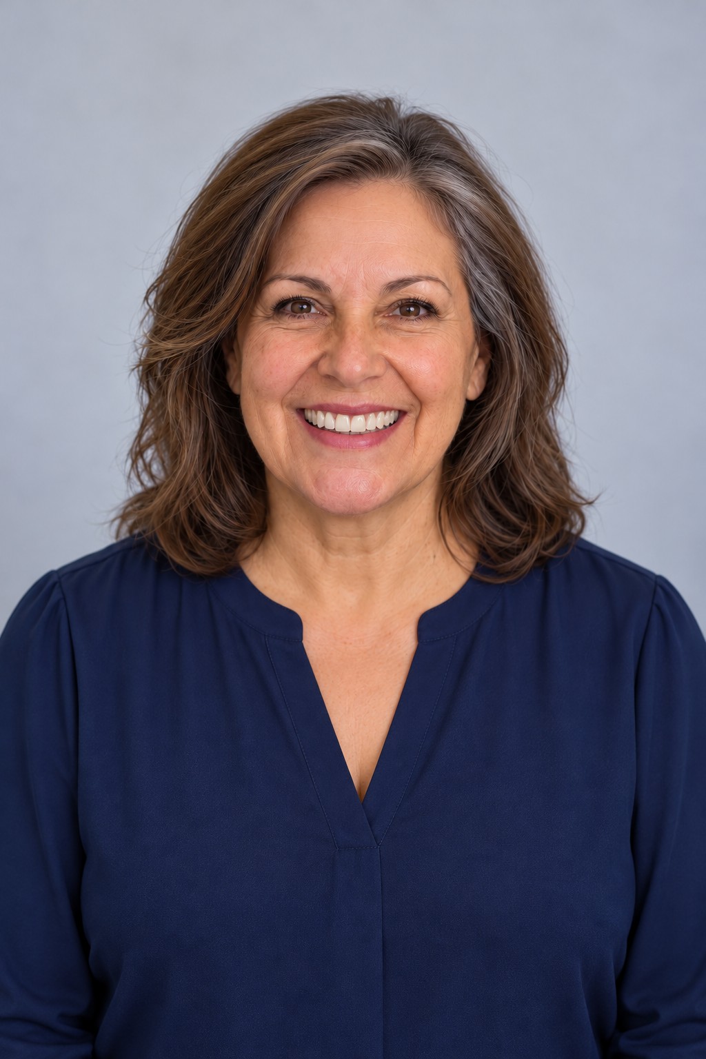 Portrait of a Dentures Plus patient with a restored smile